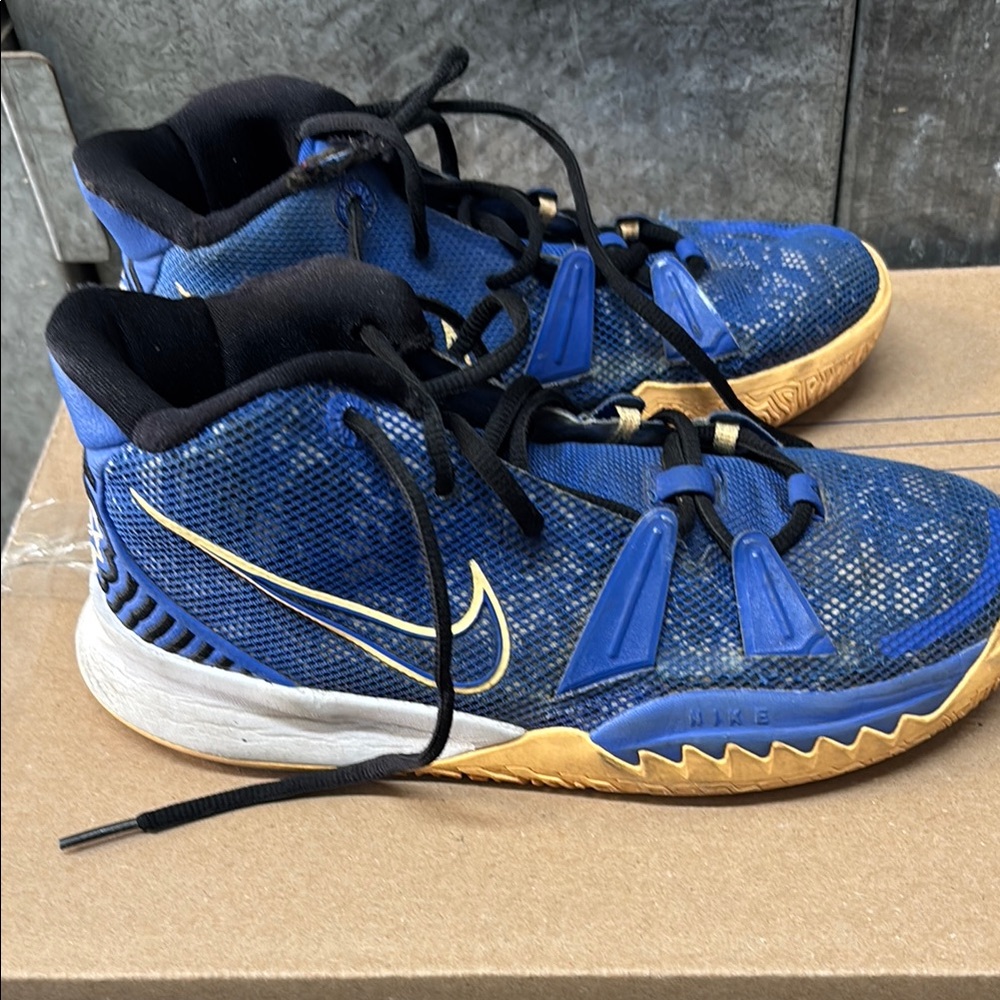 Nike Blue and Gold Sneakers with Mesh Upper and Athletic Design